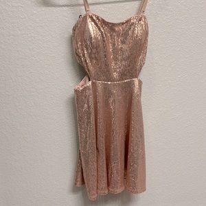 Forever 21 sparkling pink dress💕Size medium. It has two open areas on each side